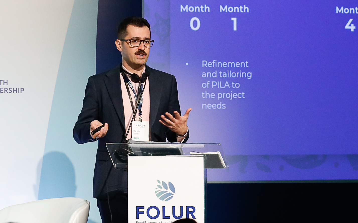 Marcelo Rezende, a natural resources officer with FAO, delivers a presentation at the FOLUR annual meeting in Sao Paulo
